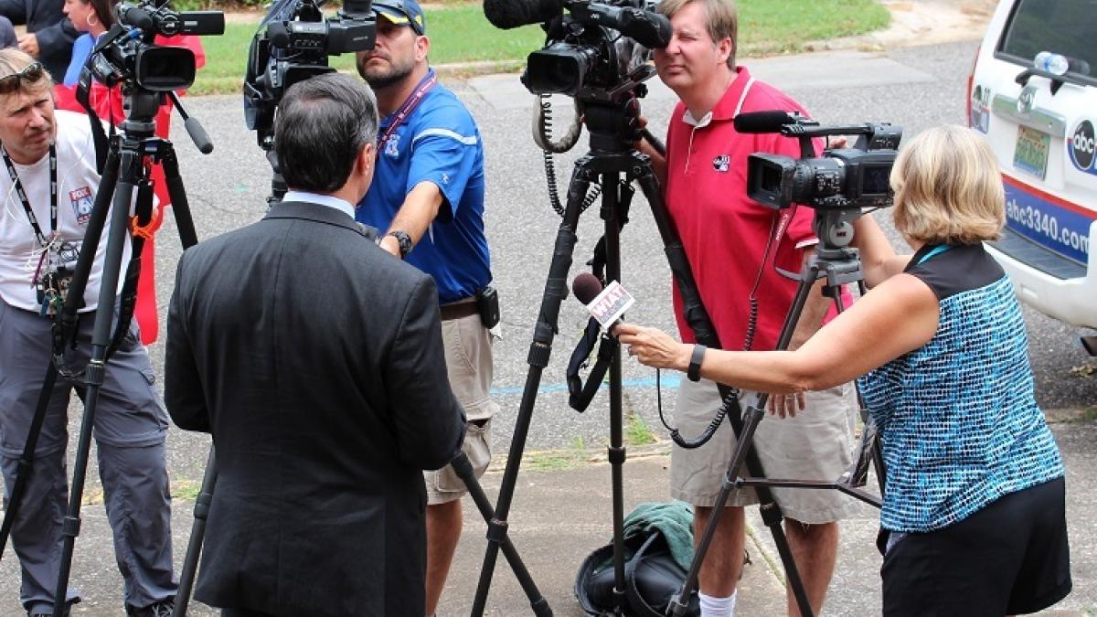 Representative Gary Palmer from back looking at cameras