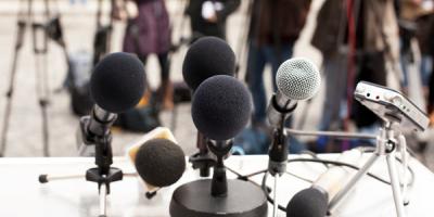 Microphones at a news conference